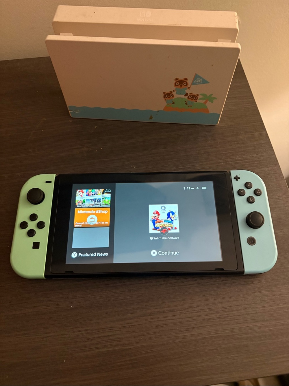 Nintendo Switch Console with Mint Green Joy-Con Controllers